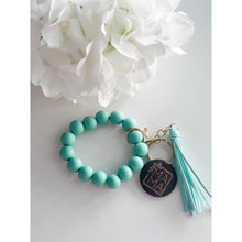 Load image into Gallery viewer, MAMA Wooden Charm Silicone Wristlet Keychain - A Mama&#39;s Lullaby
